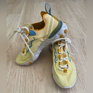 Women’s Yellow White and Blue Nike Reacts